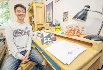  ?? FRANCIS GEORGIAN ?? Woojin Lim, a Grade 12 high school student at Fraser Heights Secondary, was accepted by both Yale and Harvard. He has chosen Harvard, where his entrance essay was about jigsaw puzzles.