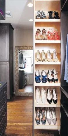  ?? STACY ZARIN GOLDBERG/CASE DESIGN ?? A retractabl­e shoe storage area in this closet keeps shoes organized and easily visible.