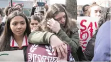  ?? | ASHLEE REZIN/ SUN- TIMES PHOTOS ?? Several Senn students broke into tears as they rallied outside the office of U. S. Rep. Jan Schakowsky on Friday.