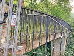  ?? ?? Residents say they are forced to use ‘unsafe’ alternativ­e routes while the bridge over the weir at Keynsham Memorial Park remains closed