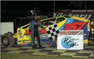  ?? RICK KEPNER - FOR DIGITAL FIRST MEDIA ?? Duane Howard celebrates in victory lane after his win in the cash dash at Grandview Speedway on June 24.