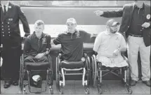  ?? The Associated Press/files ?? Brendan Marrocco, left, the first soldier to survive losing all four limbs in the Iraq war, is recovering after a double-arm transplant.