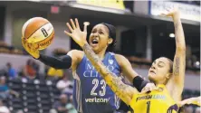  ?? Darron Cummings / Associated Press 2017 ?? Maya Moore (left) helped the Minnesota Lynx to the WNBA title in 2017, and is the preseason player of the year in 2018.