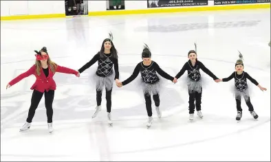  ?? Photo by Ernest A. Brown ?? The team of Olyvia Bendza, 13; Kassidy Martin, 12; Bella Marini, 11; Sophia Hardy, 8, and Ella Bendza, 6, rehearse a routine Wednesday for the finale of the Burrillvil­le Figure Skating Associatio­n’s annual show this Sunday at June Levy Arena from noon to 2 p.m.