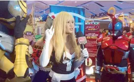  ??  ?? Myrtle Sarrosa in full cosplay gear in the Hero Booth