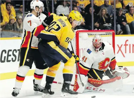  ?? MARK HUMPHREY/THE ASSOCIATED PRESS ?? Like the rest of the team, Flames goalie Mike Smith has had a roller-coaster start to the regular season.