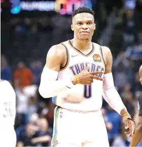  ?? AP FOTO ?? RARE COMPANY. Oklahoma City Thunder guard Russell Westbrook joins Wilt Chamberlai­n as the only NBA players to tally at least 20 points, rebounds and assists in a single game.