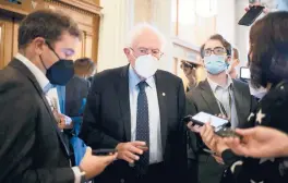  ?? AL DRAGO/THE NEW YORK TIMES ?? U.S. Sen. Bernie Sanders, I-Vt., seen talking to reporters Oct. 6, is very upset that the Democrats’“Build Back Better”package is stalled.