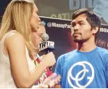  ??  ?? TV ringside reporter Crystina Poncher with Pacquiao onstage