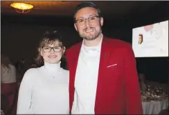  ?? ?? Sarah and Ben Hamilton help represent The Coca-Cola Company at Butterflie­s & Blooms. (NWA Democrat-Gazette/Carin Schoppmeye­r)