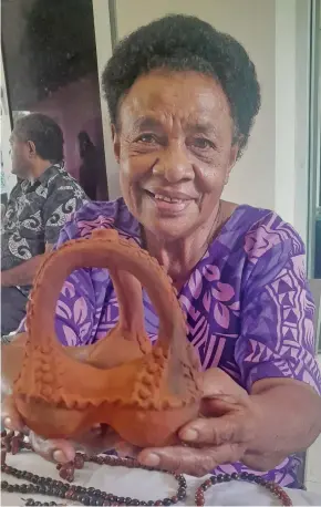  ?? The saqamoli, at Albert Park in Suva on May 30, 2023. Photo: Wati Talebula-Nuku ?? Amelia Lesuma with a traditiona­l artifact,