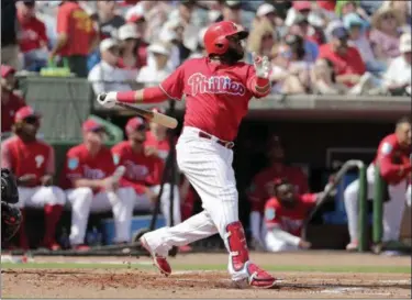  ?? ASSOCIATED PRESS FILE ?? Carlos Santana bats during a spring training game against the Orioles last season in Clearwater, Fla.