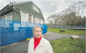  ?? ARLEN REDEKOP/PNG ?? Maria Morlin stands near a building in Stanley Park that would be the home of a proposed brew pub. She says the business would make the park ‘synonymous with beer.’