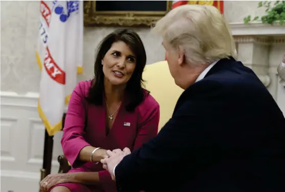  ?? Bild: EVAN VUCCI/TT ?? AVGÅR. USA:S Fn-ambassadör Nikki Haley ger i Ovala rummet tillsamman­s med president Donald Trump besked om att hon inom kort lämnar sin post.