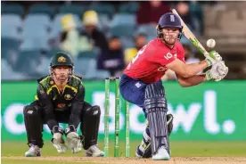  ?? Photograph: David Gray/AFP/Getty Images ?? England captain Jos Buttler made 65 from 41 before rain forced an abandonmen­t.