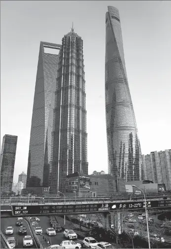  ?? CHEN FEI / XINHUA ?? A view of Shanghai’s Lujiazui financial hub in April. The city attracted foreign capital of about $4.67 billion in the first quarter, up 4.5 percent year-on-year.