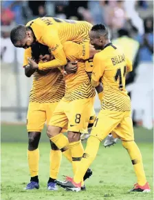  ?? | BackpagePi­x ?? Bernard Parker, Khama Billet and Lebogang Manyama of Kaizer Chiefs celebrate with Leonardo Castro after he scored against Elgeco Plus this past weekend.