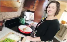  ?? GAVIN YOUNG ?? Calgary cook book author Elizabeth Chorney-Booth is picking up where longtime Herald restaurant writer John Gilchrist left off.