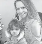  ?? PROVIDED BY GRIEM FAMILY ?? Elizabeth Griem, shown with daughter Aaliyah, said finding appointmen­ts was “a nightmare.”