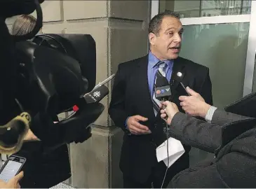  ?? BRYAN PASSIFIUME/FILES ?? Calgary police Sgt. Les Kaminski speaks to the media in January after the Crown withdrew perjury charges against him in connection with an arrest in 2008.