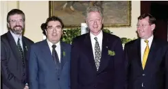  ?? ?? Making history: Gerry Adams, John Hume, Bill Clinton and Lord Trimble celebrate the Good Friday Agreement