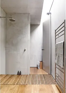  ??  ?? Project details concrete surfaces add industrial flair to this bathroom designed by melbourne-based schulberg Demkiw architects. partner the concrete with wood to introduce warm tones – a slatted, flush-fitting wood shower tray is the perfect solution...