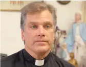  ?? SCREEN GRAB FROM CHURCH MILITANT VIDEO ?? The Rev. Paul Kalchik says he has had to go into hiding since burning an LGBTQ-friendly flag at an Avondale church.