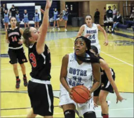  ?? GREGG SLABODA — TRENTONIAN FILE PHOTO ?? Nneka Ezeigbo’s 18 points helped Notre Dame advance to the Score at the Shore Tournament final.