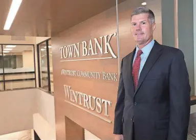  ?? MICHAEL SEARS / MILWAUKEE JOURNAL SENTINEL ?? Jay Mack, chairman, president and chief executive officer of Town Bank, is leading the bank’s growth efforts in Milwaukee and other parts of Wisconsin.