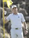  ?? AP photo ?? Sergio Garcia celebrates as he takes his ball out of the cup after making a holein-one on the fourth hole of a playoff against Lee Westwood at the Dell Technologi­es Match Play on Friday.