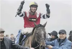  ??  ?? 0 Jack Tudor celebrates his win on Potters Corner at Chepstow.