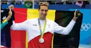  ?? AP PHOTO BY LEE JIN-MAN ?? In this Thursday, Aug. 11, 2016 file photo, Belgium’s Pieter Timmers holds up his silver medal after the men’s 100-meter freestyle during the swimming competitio­ns at the 2016 Summer Olympics, in Rio de Janeiro, Brazil. Belgian swimmer Pieter Timmers had planned to retire after Tokyo last summer.