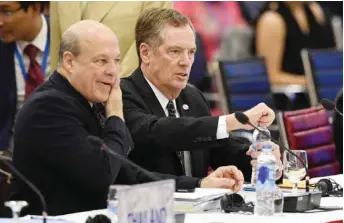  ??  ?? HANOI: US Trade Representa­tive Robert Lighthizer (right) attends the Asia-Pacific Economic Cooperatio­n (APEC) 23rd Ministers responsibl­e for Trade Meeting at the National Convention Center in Hanoi yesterday.