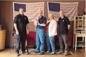  ?? PHOTO CREDIT ?? The owners and employees of Honor Defense, left to right: Pete Ramey, Gary Ramey, the owner, his wife and company business manager, Pam Ramey, and Richard Moore.