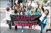  ?? Gary Coronado Los Angeles Times ?? SURVIVORS of sexual assault and their supporters march to CNN’s headquarte­rs in L.A. on Nov. 12.