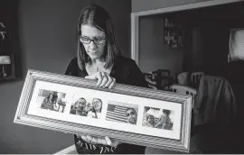  ?? Michael Ciaglo / Staff photograph­er ?? Phyllis Bhuiya holds photos Monday of her and her husband, Faruk Bhuiya, at their home. Faruk was fatally shot when the northwest Houston convenienc­e store where he worked was robbed Saturday.