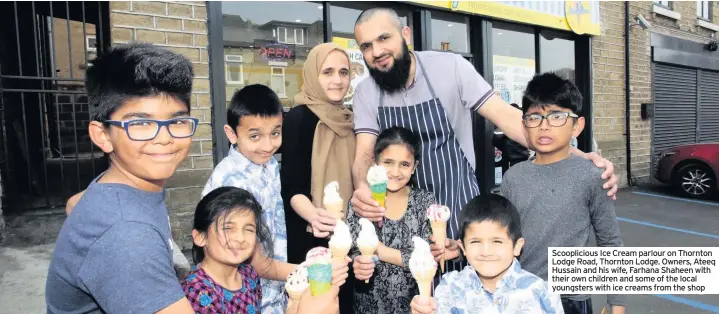  ??  ?? Scooplicio­us Ice Cream parlour on Thornton Lodge Road, Thornton Lodge. Owners, Ateeq Hussain and his wife, Farhana Shaheen with their own children and some of the local youngsters with ice creams from the shop