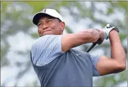  ?? AP-Eric Gay, File ?? In this 2019 file photo, Tiger Woods watches his drive on the sixth hole during round-robin play at the Dell Technologi­es Match Play Championsh­ip golf tournament, in Austin, Texas.