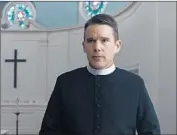  ?? A24 ?? ETHAN HAWKE portrays a reverend undergoing a crisis of faith in Paul Schrader’s “First Reformed.”