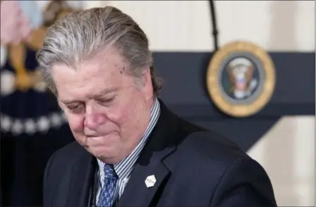  ?? ANDREW HARNIK — THE ASSOCIATED PRESS FILE ?? President Donald Trump’s White House Senior Adviser Steve Bannon arrives for a news conference with President Donald Trump in the East Room of the White House in Washington. Bannon, a forceful but divisive presence in President Donald Trump’s White...