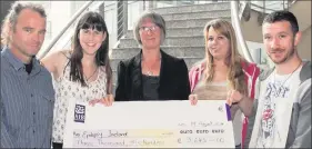  ??  ?? At the cheque presentati­on: Eamonn Fortune, Rebecca Murray, Joan Ryan of Epilepsy Ireland, Chelsea Bail and Richard McCann. RIGHT: Rebecca in Santiage after the Camino.