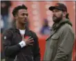  ?? RON SCHWANE — THE ASSOCIATED PRESS ?? Browns quarterbac­k DeShone Kizer and tackle Joe Thomas talk before a game against the Ravens on Dec. 17. Without Thomas, there has not been many bright spots for the Browns this year.