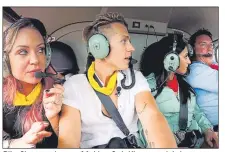  ??  ?? Rita Simons, James McVey, Sair Khan and John Barrowman look anxious as they fly in on chopper