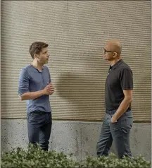  ?? IAN C. BATES THE NEW YORK TIMES ?? Sam Altman, left, who manages the company OpenAI, and Satya Nadella, the chief executive of Microsoft, which is investing $1 billion in OpenAI, talk at the Microsoft Campus in Redmond, Washington. Altman’s 100-employee company wants to create a machine that can do anything the human brain can do. Skeptics wonder if it is possible.