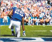  ?? BRYAN BENNETT – GETTY IMAGES ?? LeSean McCoy of the Buffalo Bills takes a knee during the national anthem before an NFL game against the Denver Broncos on Sunday.