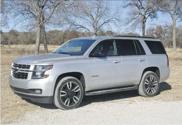  ?? LESLEY WIMBUSH/DRIVING ?? The 2018 Chevrolet Tahoe RST provides a smooth ride over bumps and has good road manners despite its large size.