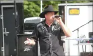  ?? CHARLES PRITCHARD - ONEIDA DAILY DISPATCH ?? Jeff Hinman sings at the Canastota American Legion 100th anniversar­y on Saturday.