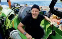  ??  ?? Rolex Testimonee, filmmaker and explorer, James Cameron in the Deepsea Challenger submersibl­e