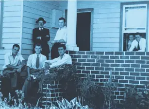  ??  ?? Joe Radojevic (in black) with new Croatian immigrants staying at his family home.