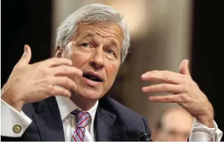  ?? /Reuters/File ?? Worst is over: JPMorgan CEO Jamie Dimon has told investors he is convinced the worst is behind the internatio­nal lender in terms of losses on buyout financing, and it has ‘no real leveraged write-downs’ for the third quarter.